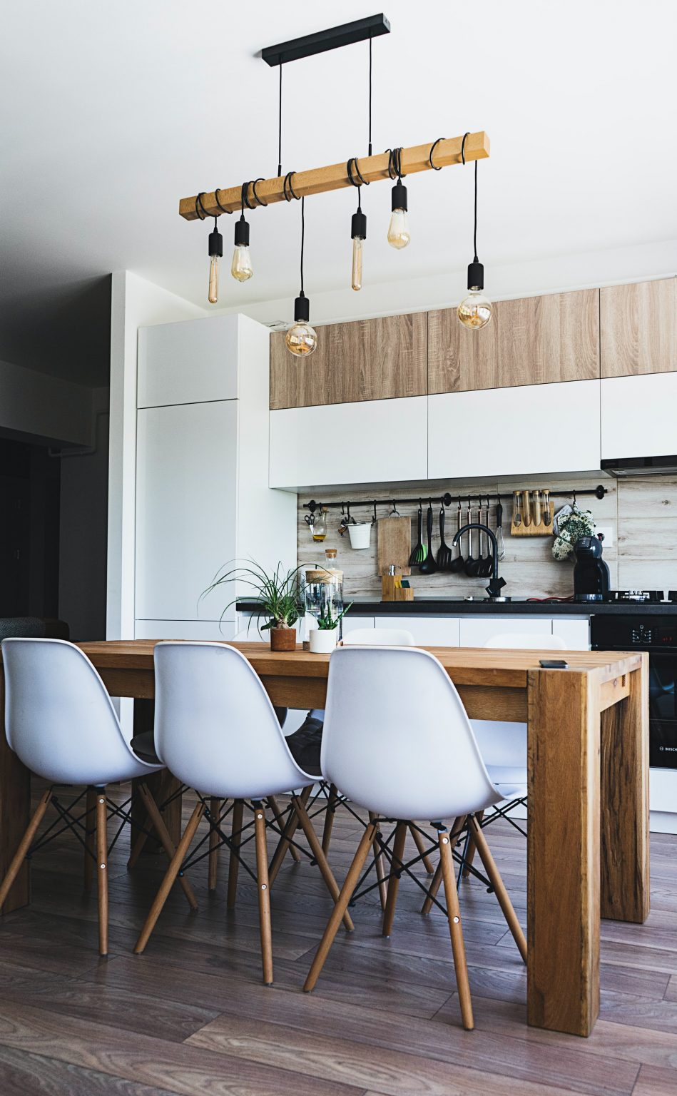 a kitchen with a chandelier