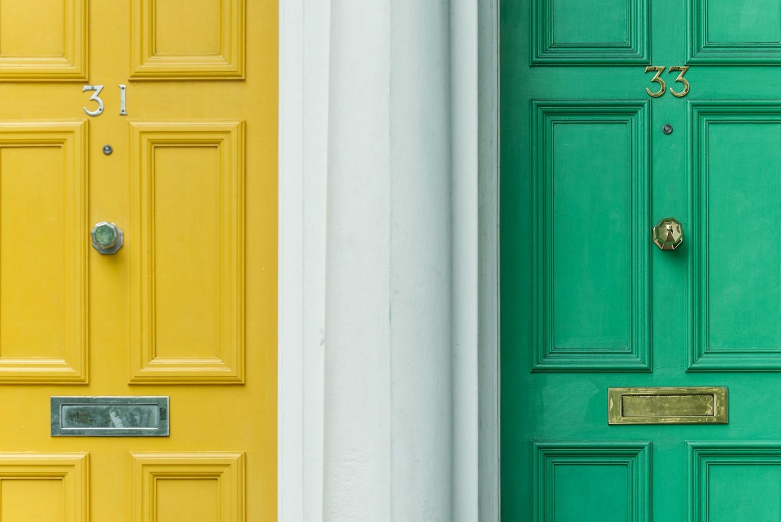 a green door with a white door