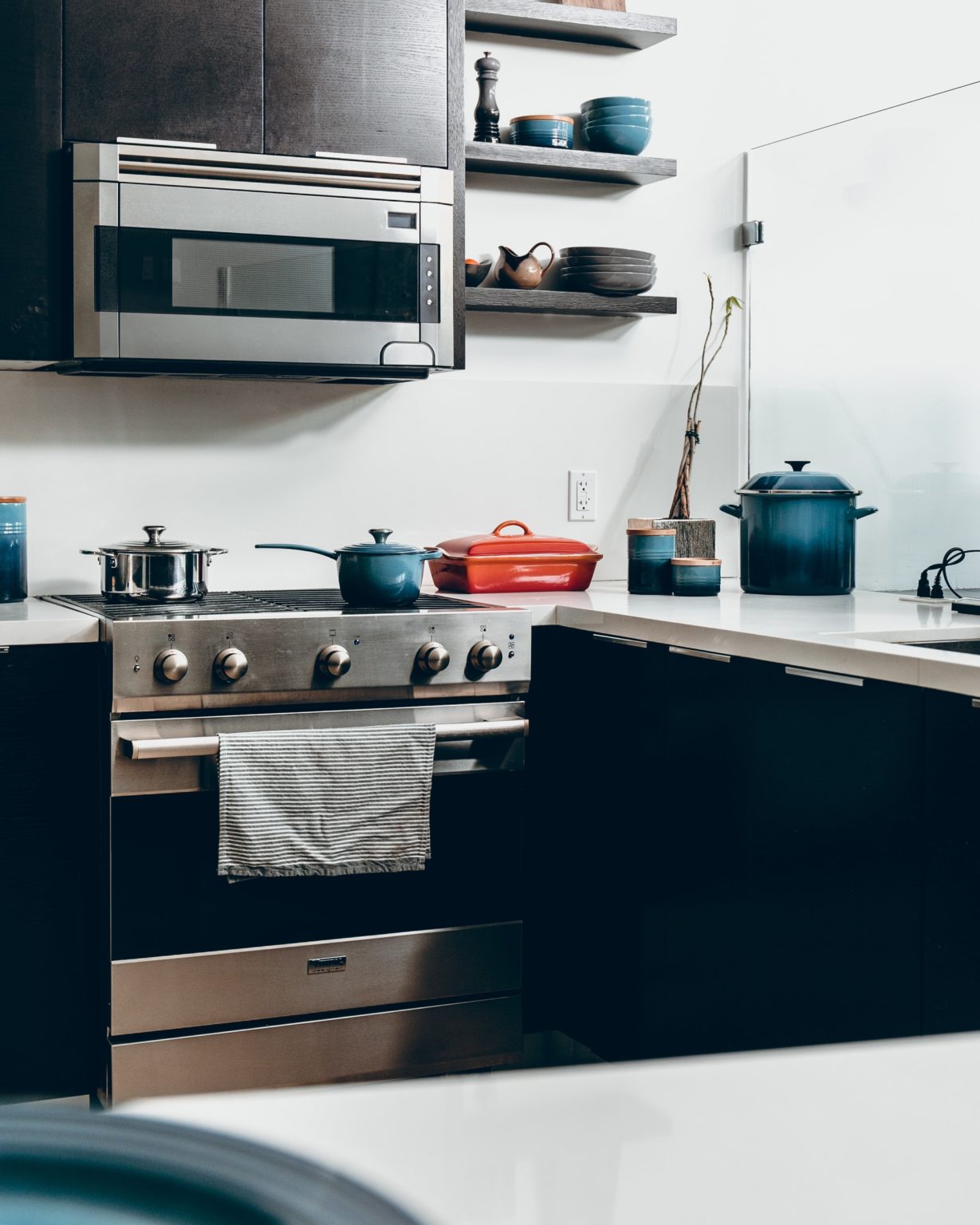 a kitchen with a microwave oven and a stove