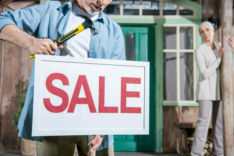 a man holding a sign